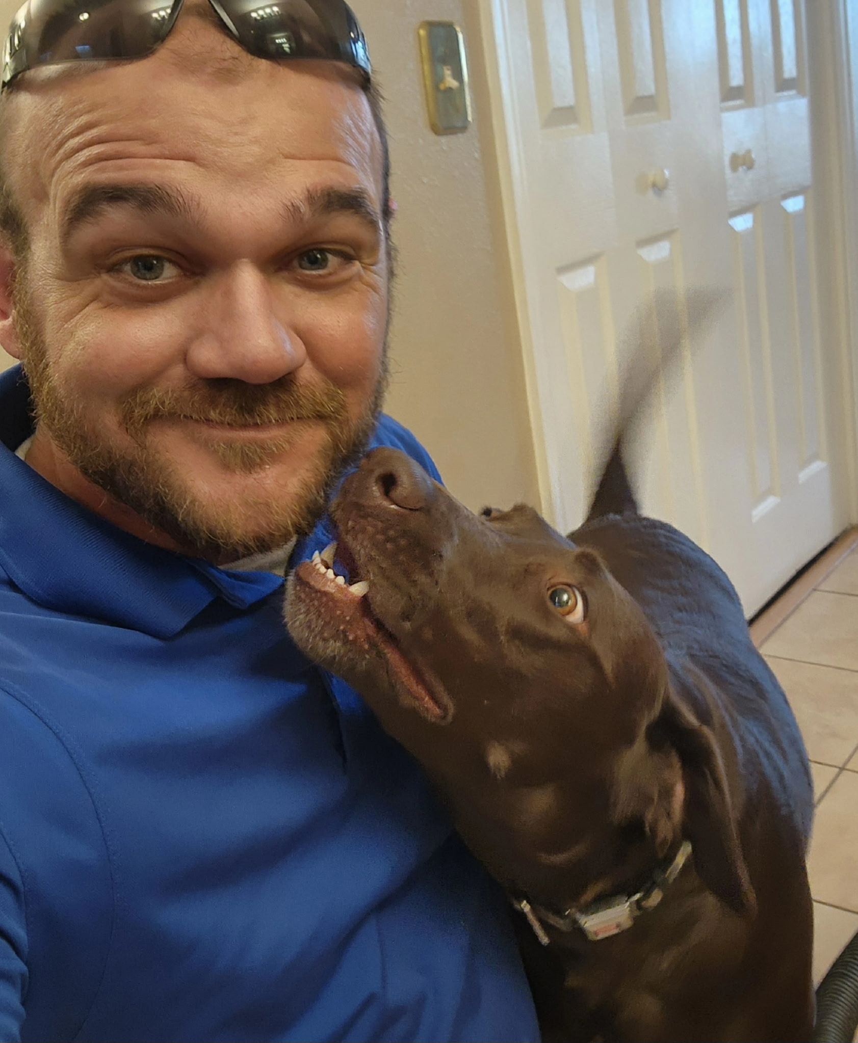 Farrell plumber with a customer's dog