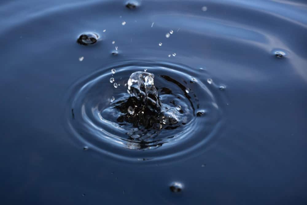 water droplet creating a ripple effect