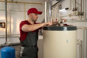 plumber inspecting a water heater New Port Richey, FL