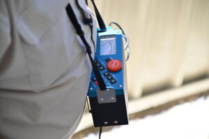 technician setting up leak detection equipment